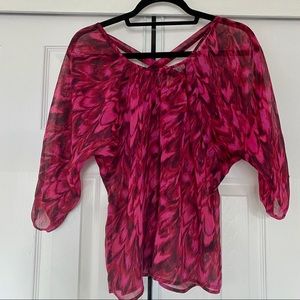 Red patterned blouse